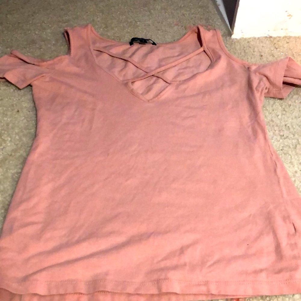 Lush pink revealing off the shoulder shirt
